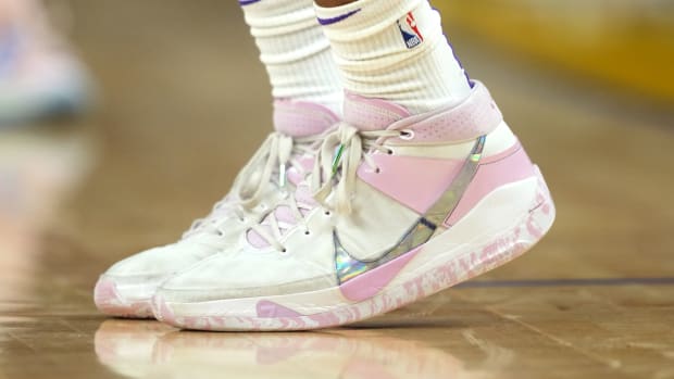 Shareef O'Neal plays in a pair of Nike KD 13 'Kay Yow - White Light Arctic Pink'